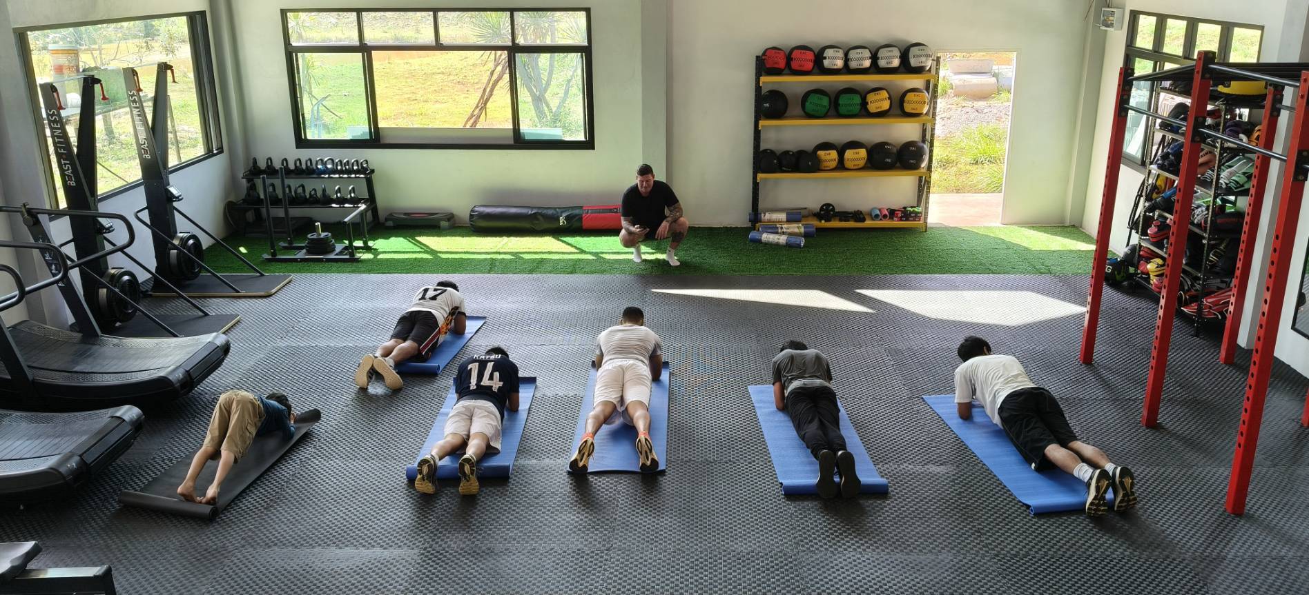 Group bodyweight workout with coach